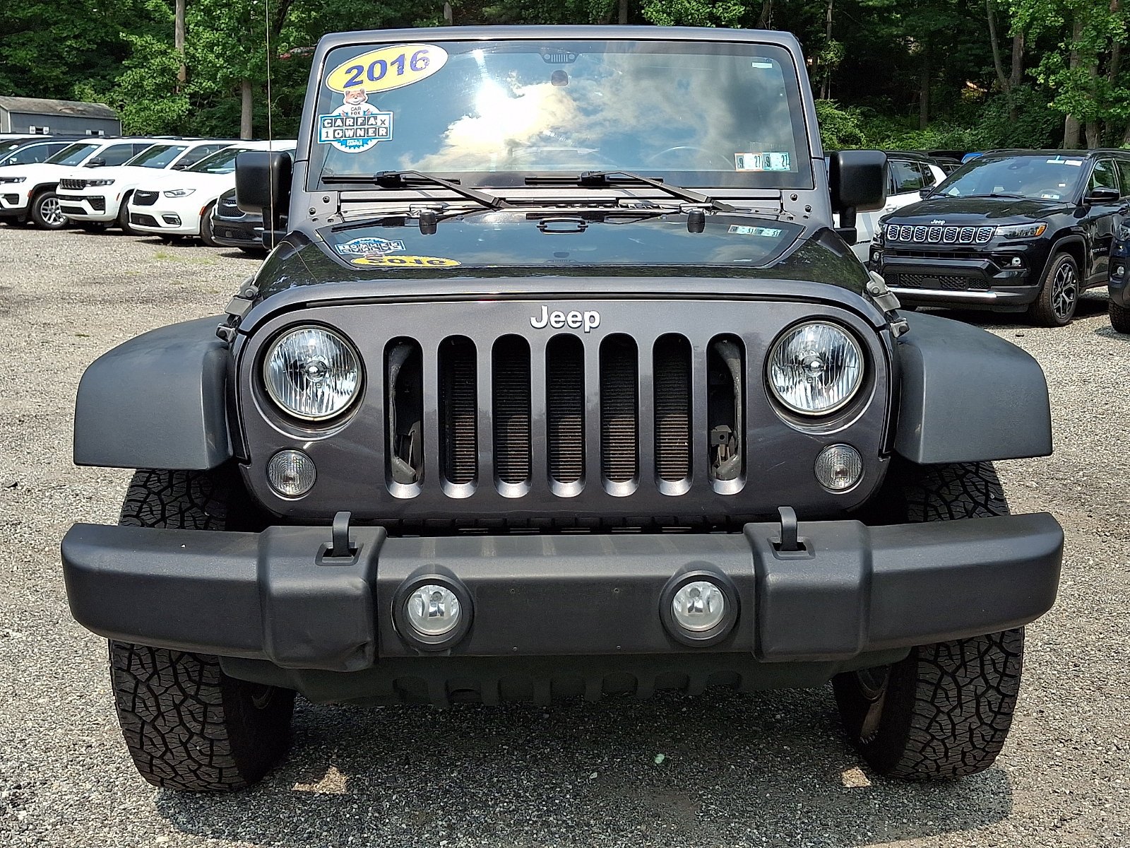 Used 2016 Granite Crystal Metallic Clearcoat Jeep Sport image 2