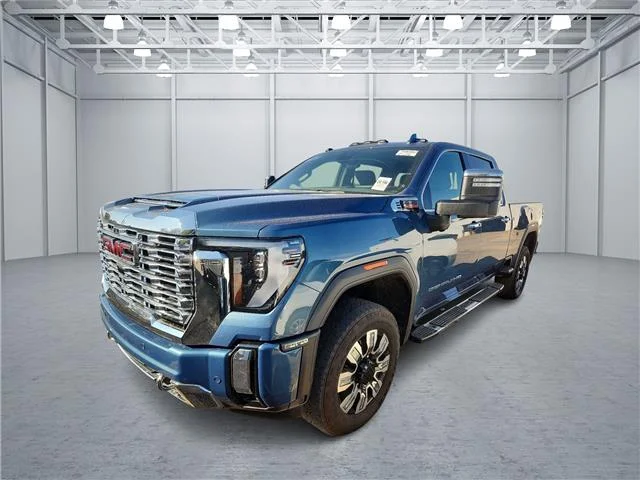 Used 2024 Blue GMC Denali 4x4 Crew Cab 6.75 ft. box 159 in. WB image 1