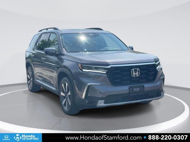 Used 2024 Crystal Black Pearl Honda Touring image 1