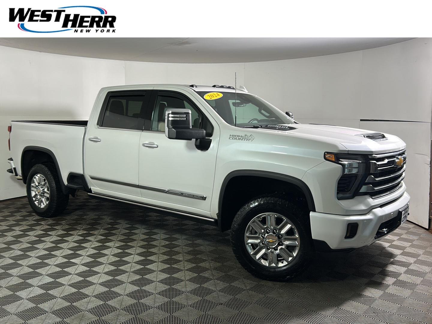 Used 2024 Iridescent Pearl Tricoat Chevrolet High Country image 1