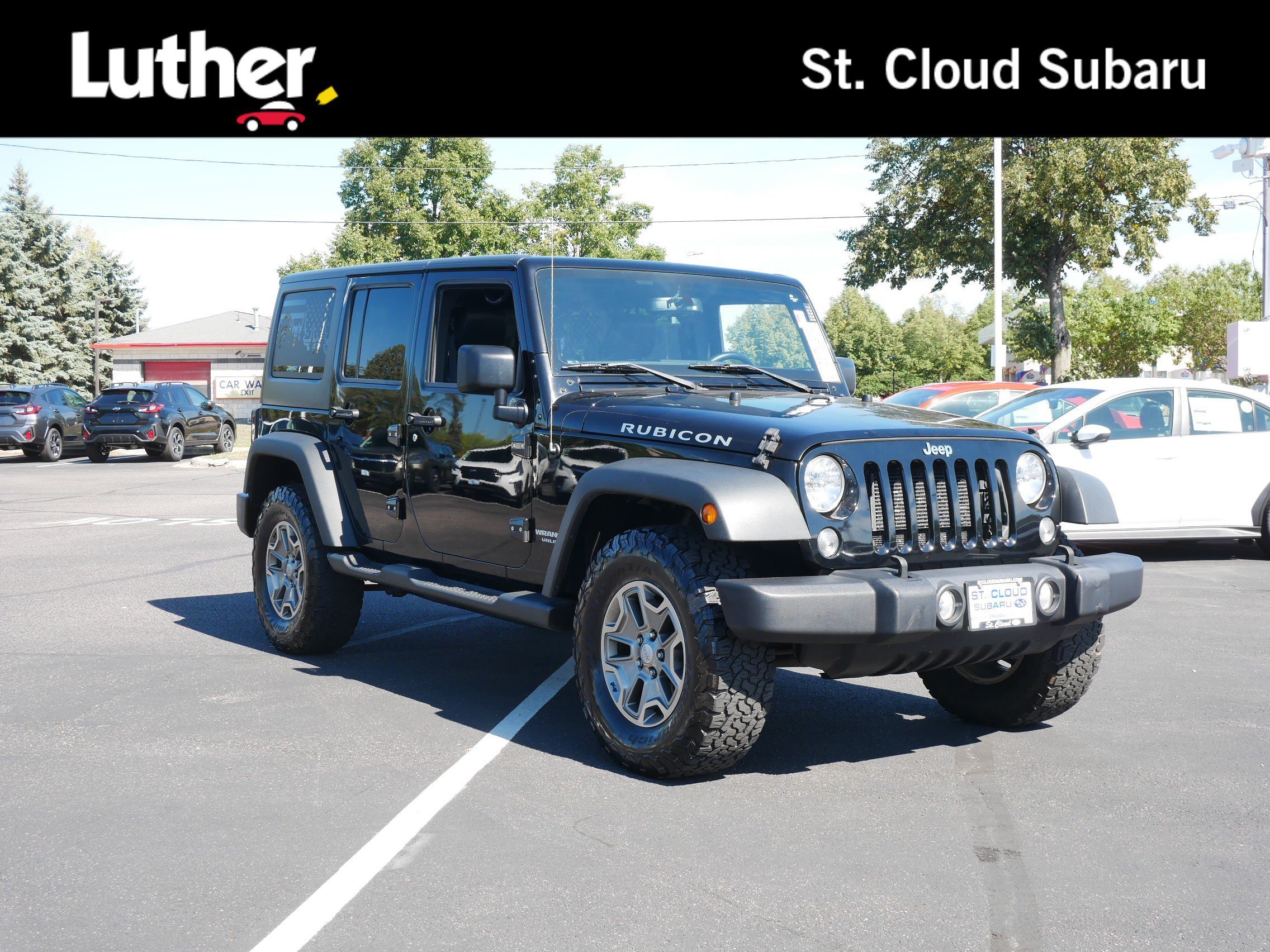 Used 2015 Black Clearcoat Jeep Rubicon image 1