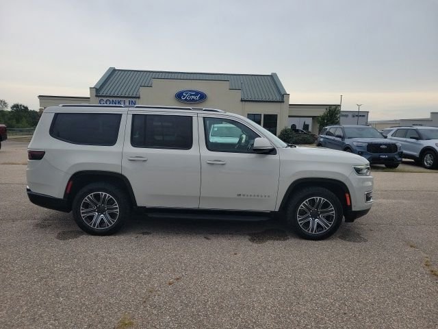 Used 2022 White Pearl Jeep Series III image 23
