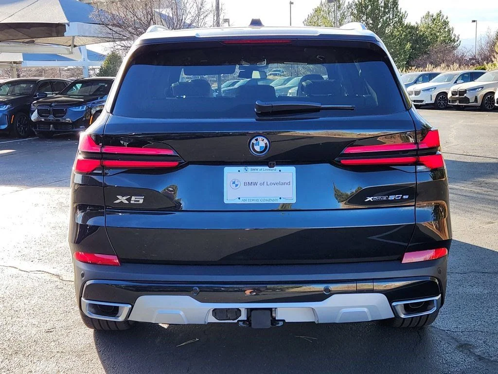 Used 2026 Black Sapphire Metallic BMW xDrive50e image 4