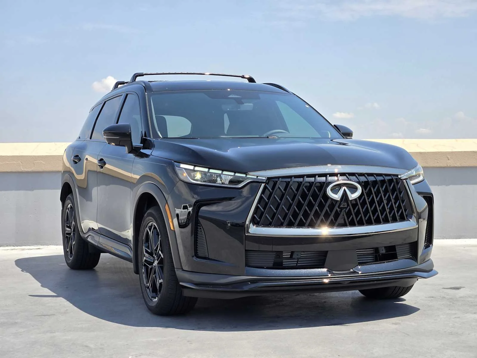 New 2026 MINERAL BLACK INFINITI Sport AWD image 2