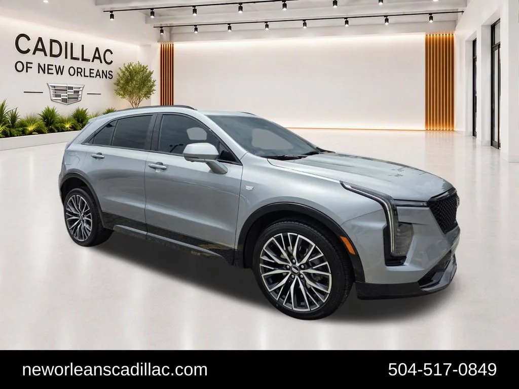 Used 2024 Silver Cadillac Sport image 1