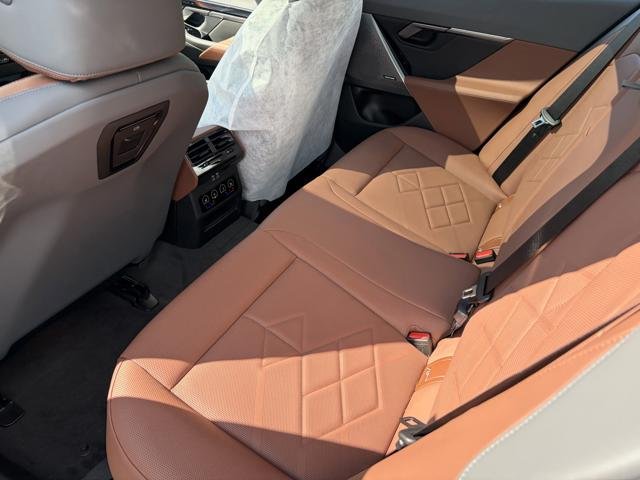 New 2026 Black Sapphire Metallic BMW 550e xDrive image 17