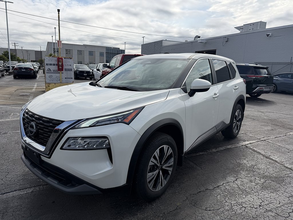 Used 2023 Pearl White TriCoat Nissan SV image 1