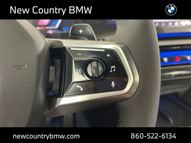 New 2026 Mineral White Metallic BMW 550e xDrive image 13