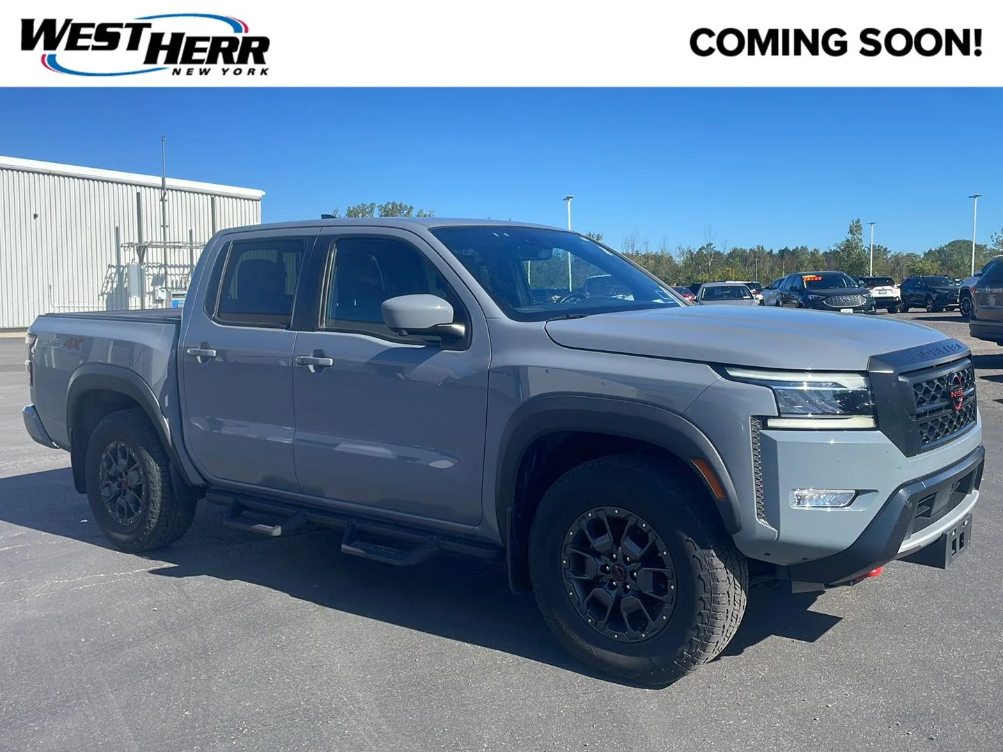 Used 2023 Boulder Gray Pearl Nissan PRO-4X image 1