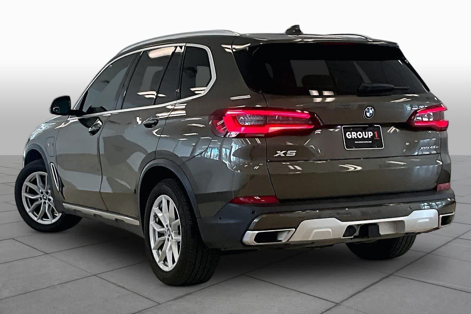 Used 2023 Manhattan Green Metallic BMW xDrive45e image 11