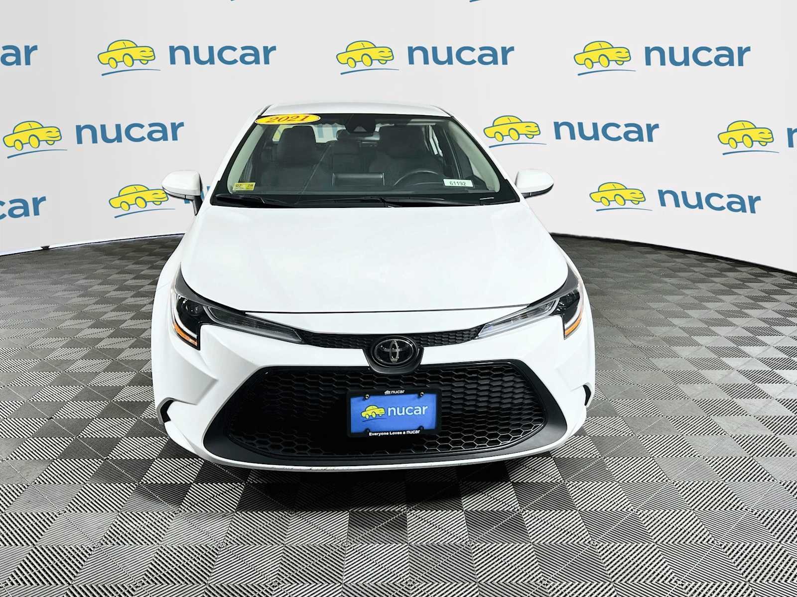 Used 2021 Super White Toyota LE image 2