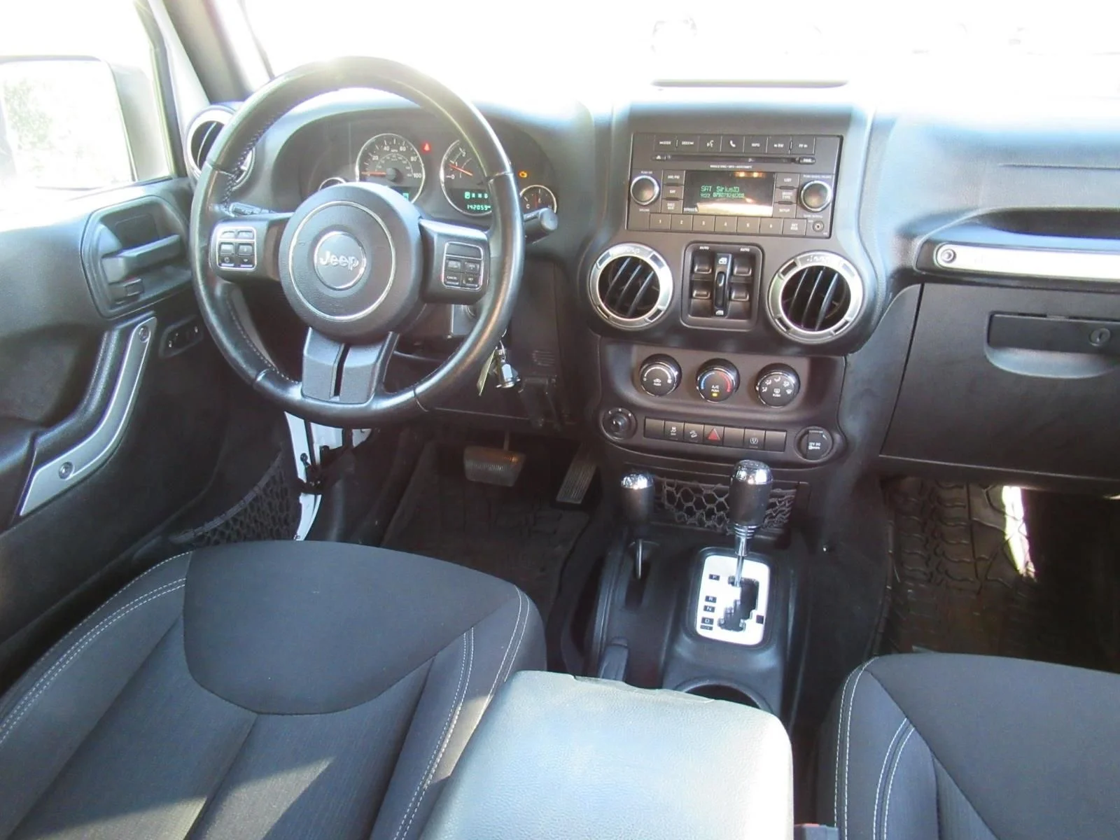 Used 2017 White Jeep Unlimited Sahara image 14