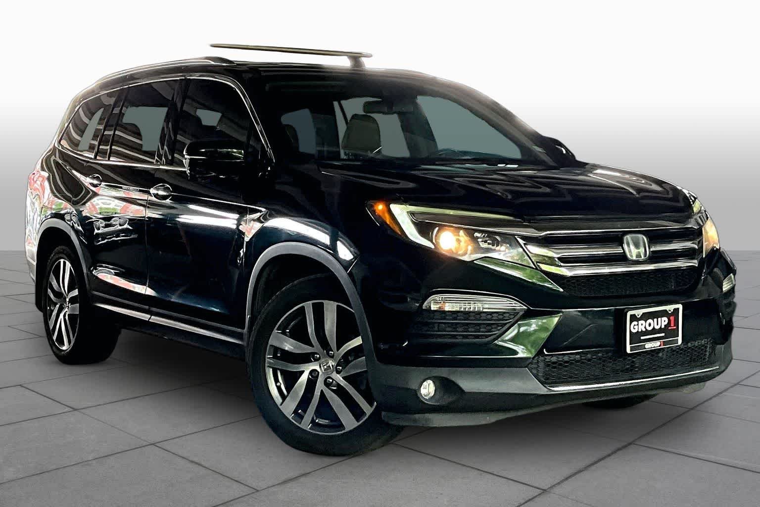 Used 2016 Black Forest Pearl Honda Touring image 2