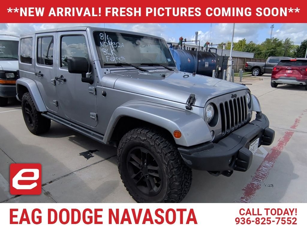 Used 2017 Silver Jeep Unlimited Sahara image 1