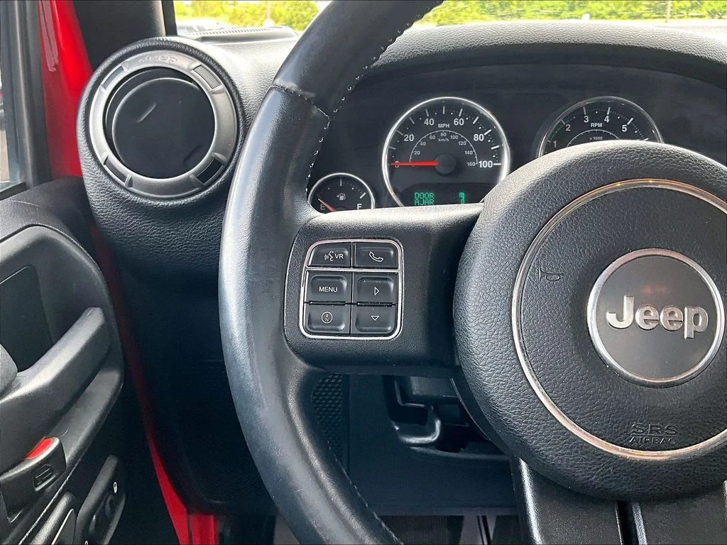 Used 2015 Red Jeep Unlimited Sport image 16