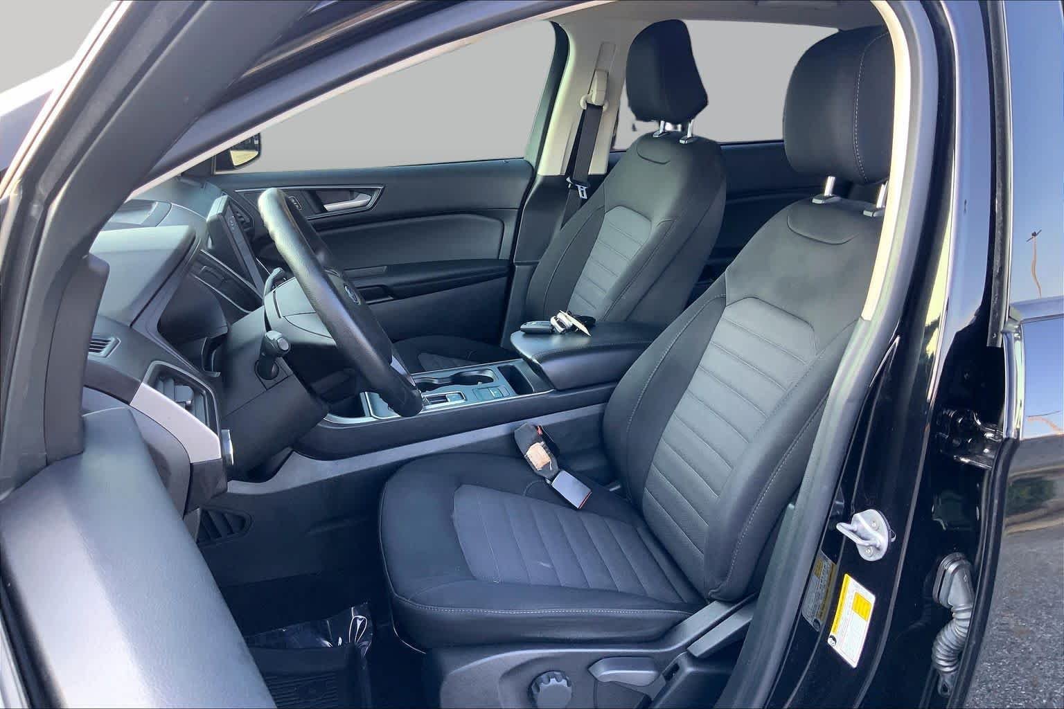 Used 2024 Agate Black Metallic Ford SE image 8