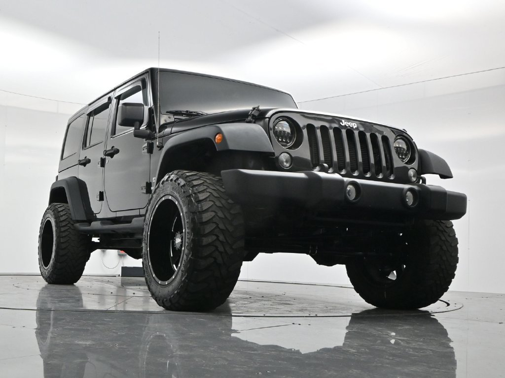 Used 2014 Black Clearcoat Jeep Unlimited Sport image 47