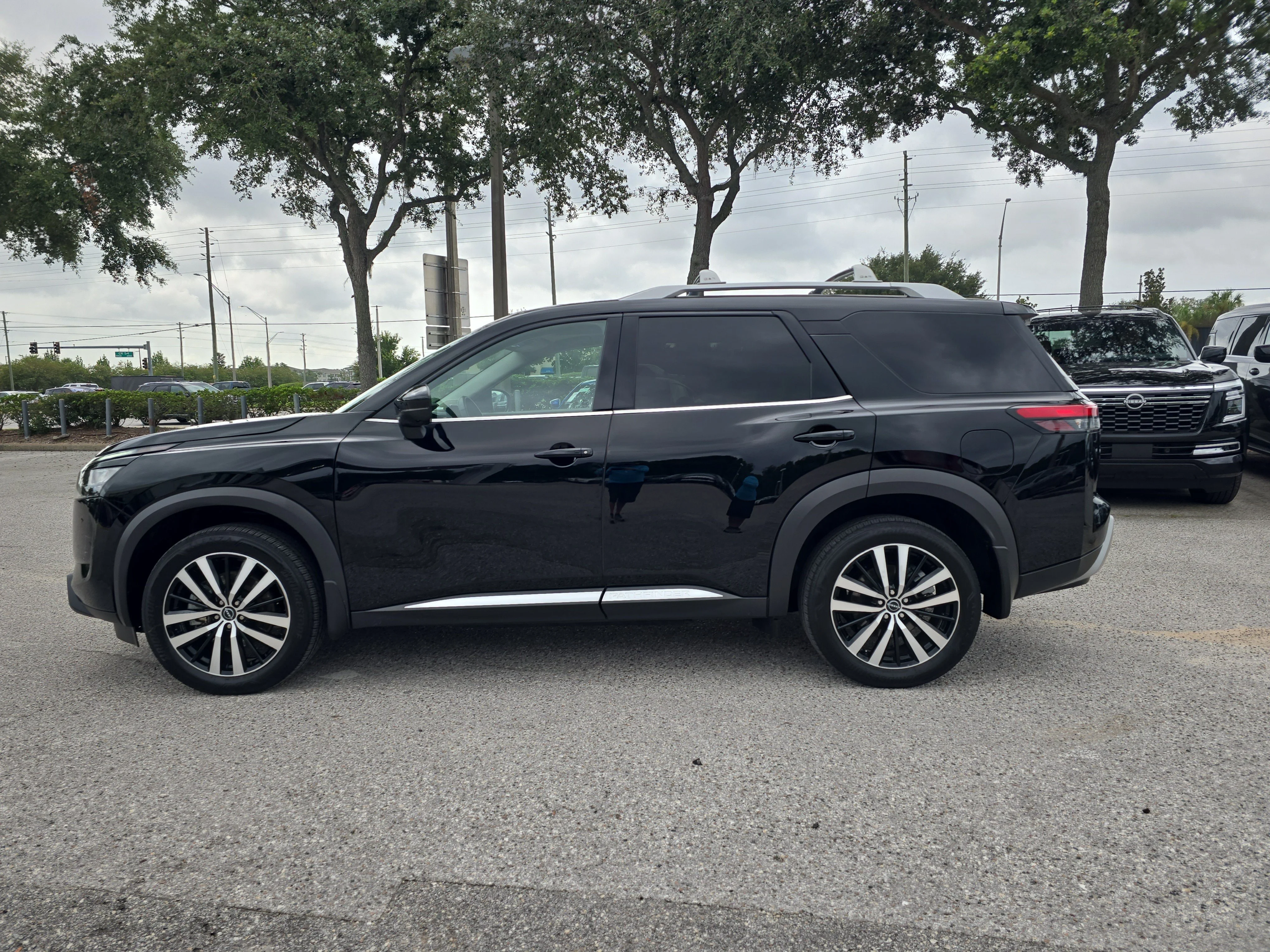 Certified Used 2025 Super Black Nissan Platinum image 5