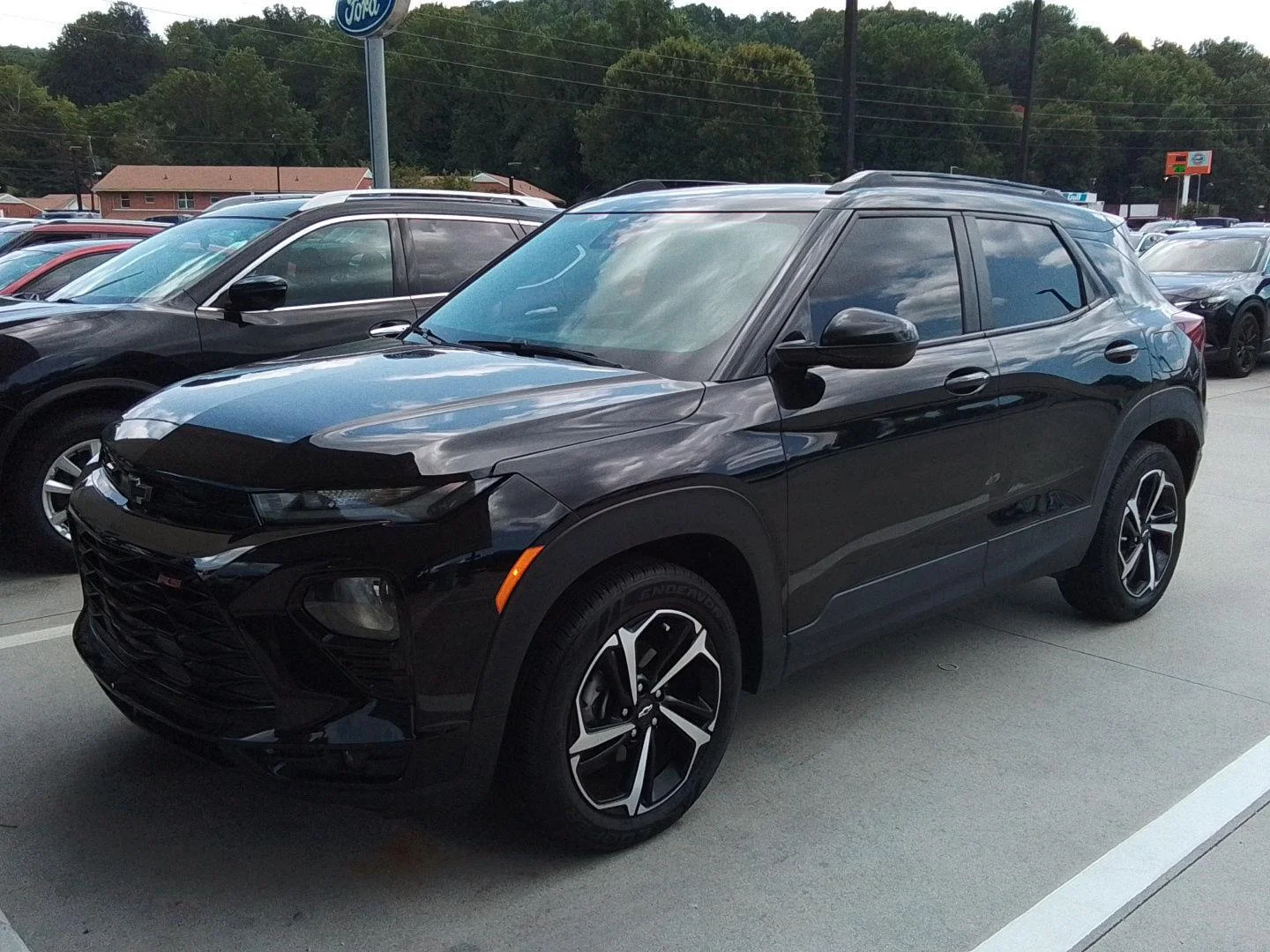 Used 2022 MOSAIC BLACK METALLIC Chevrolet RS image 1