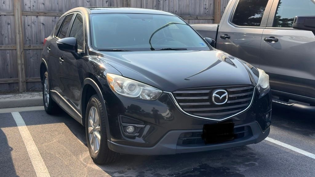 Used 2016 Jet Black Mica Mazda Touring image 1