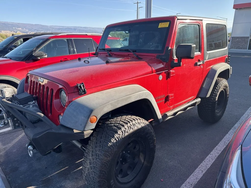 Used 2014 Jeep Wrangler Sport with VIN 1C4AJWAG3EL261533 for sale in Delta, CO