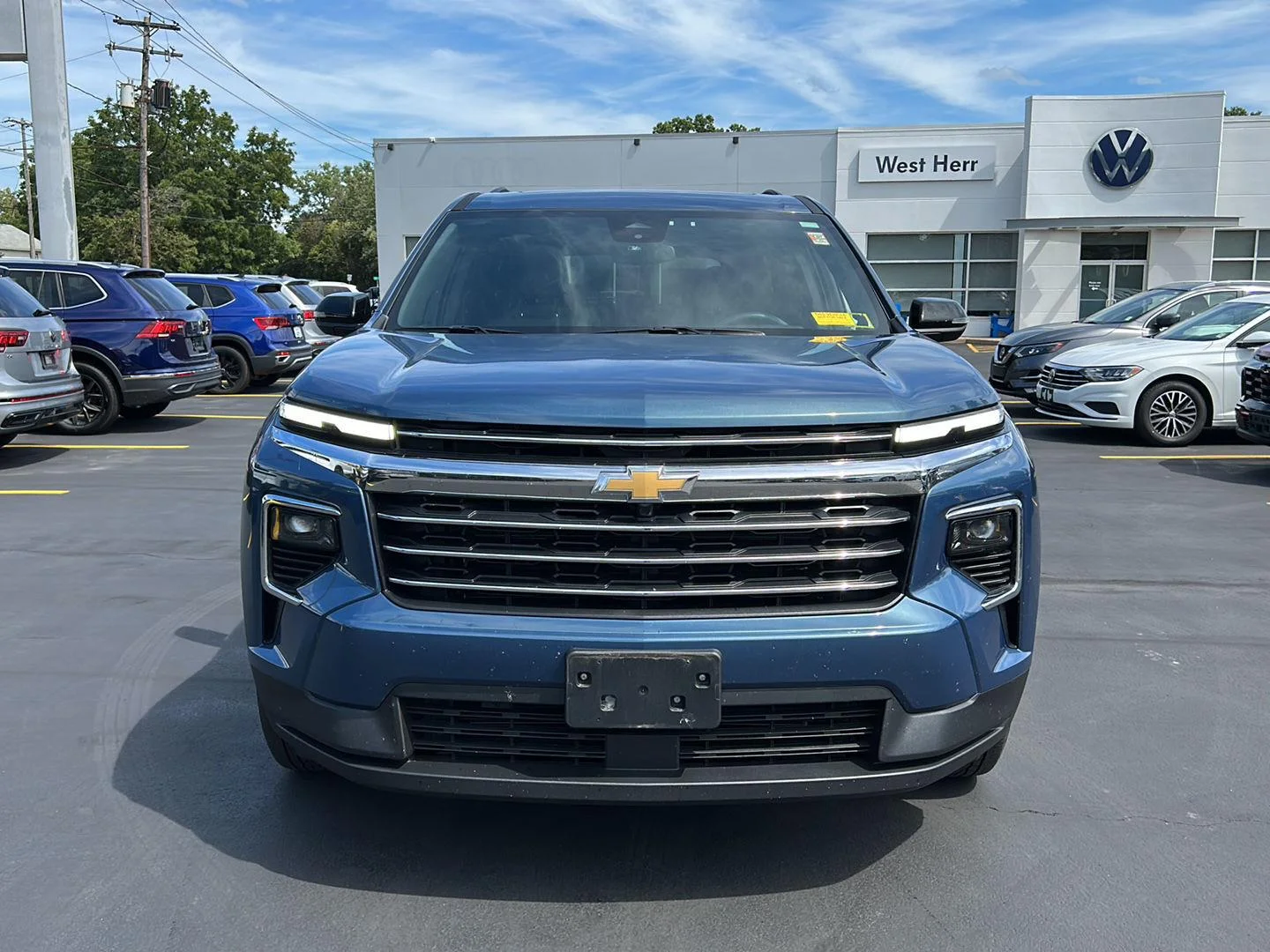 Used 2025 Lakeshore Blue Metallic Chevrolet AWD LT image 2