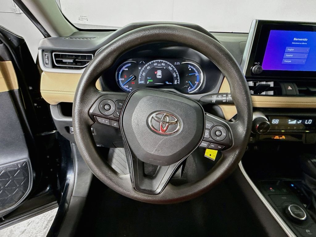 Used 2024 Midnight Black Metallic Toyota Hybrid LE image 12