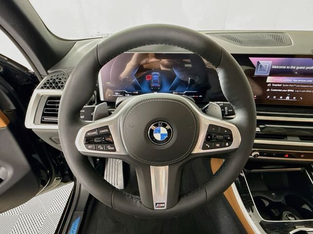 New 2026 Black Sapphire Metallic BMW xDrive40i image 11