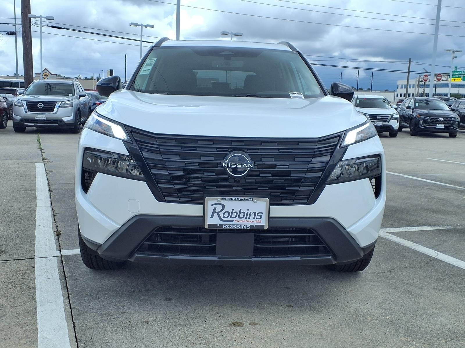 2026 Nissan Rogue Dark Armor™ White at Robbins Nissan