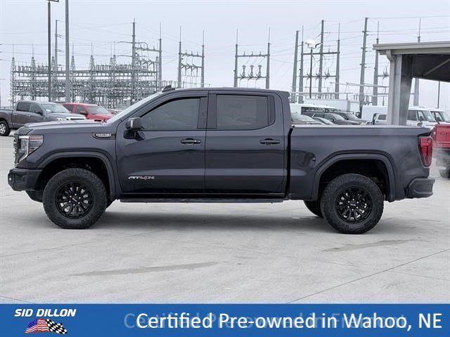 Used 2023 Titanium Rush Metallic GMC AT4X image 9
