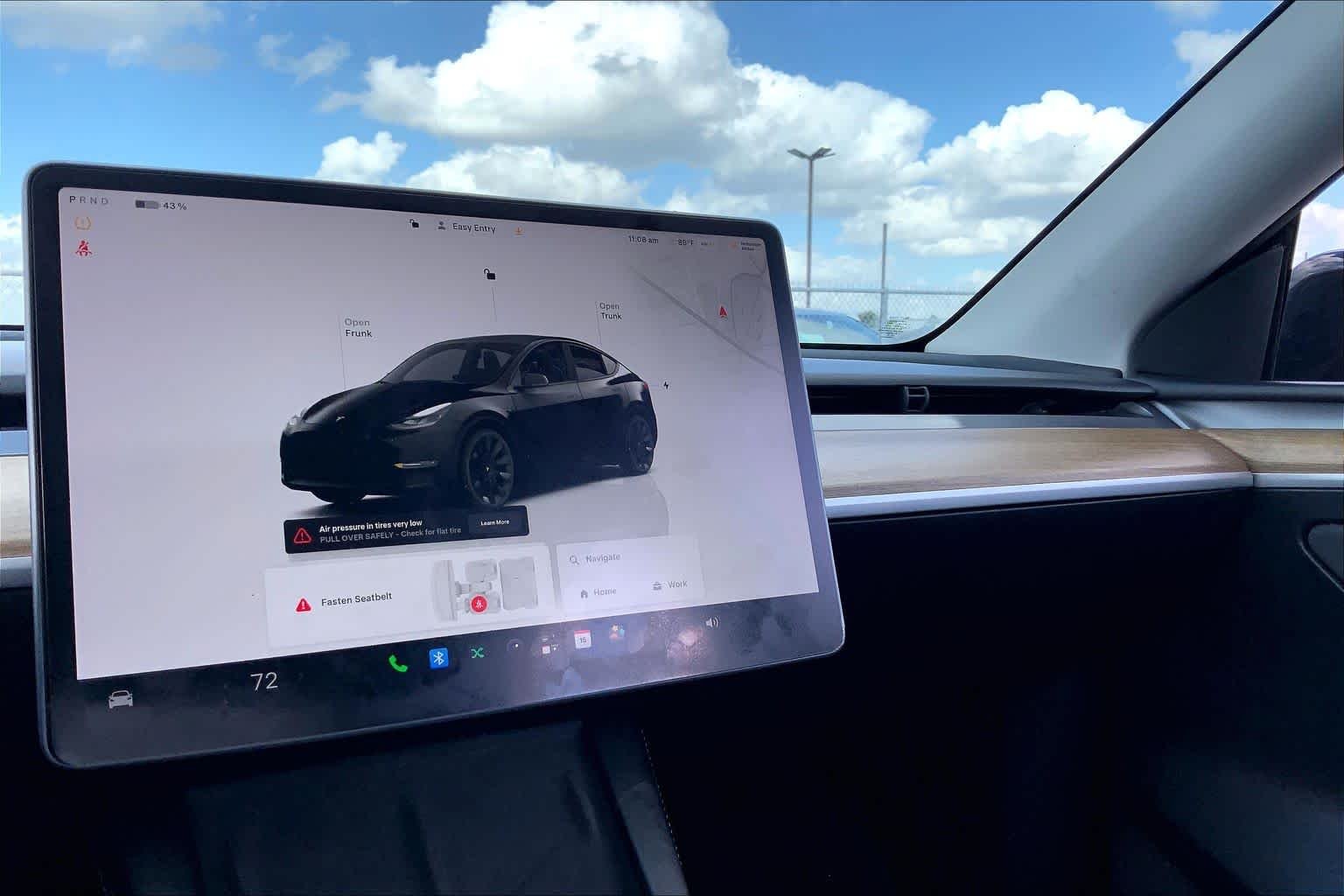 Used 2024 Solid Black Tesla  image 30