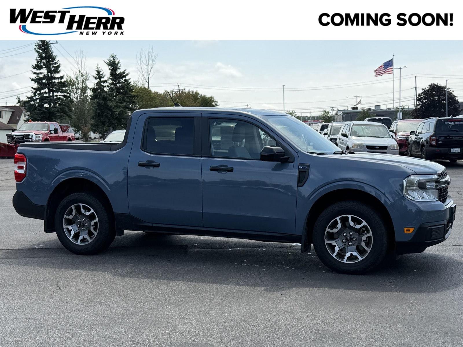 Used 2024 Azure Gray Metallic Tri-Coat Ford XLT image 1