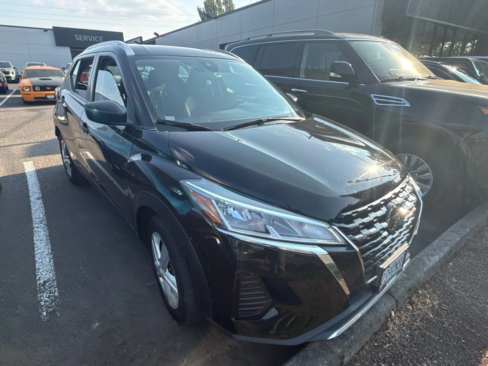 Used 2021 Super Black Nissan S image 2