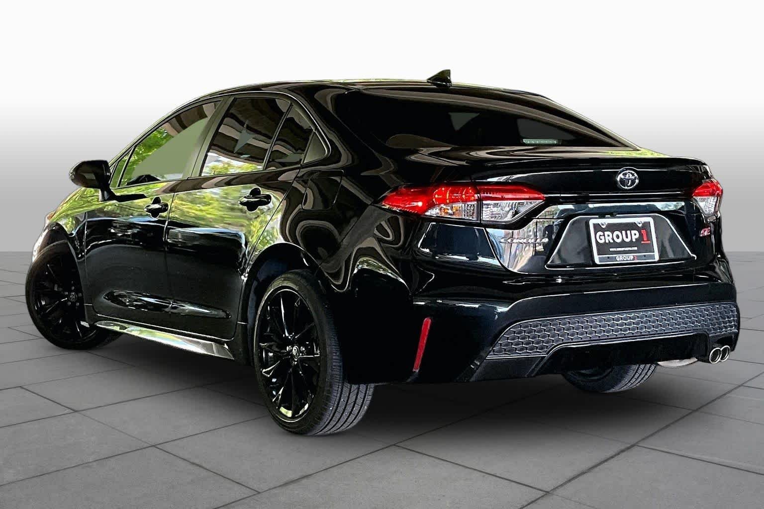 Used 2022 Black Sand Pearl Toyota SE image 11