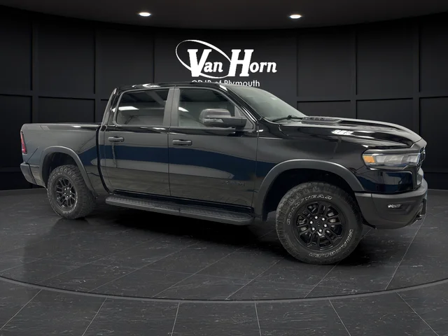 Used 2025 Diamond Black Ram Rebel image 1