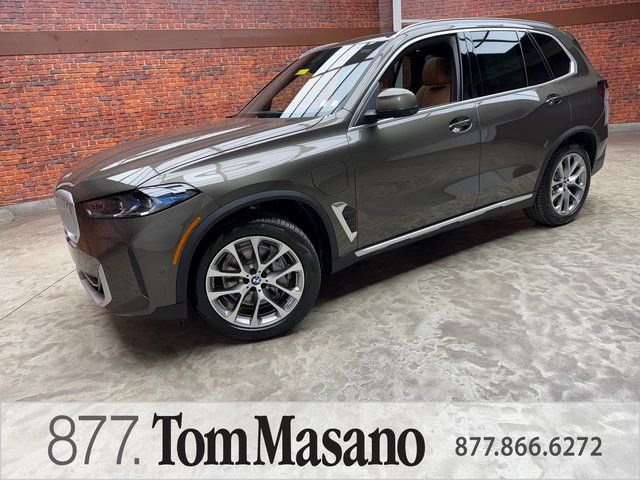 New 2026 Green BMW xDrive50e image 1