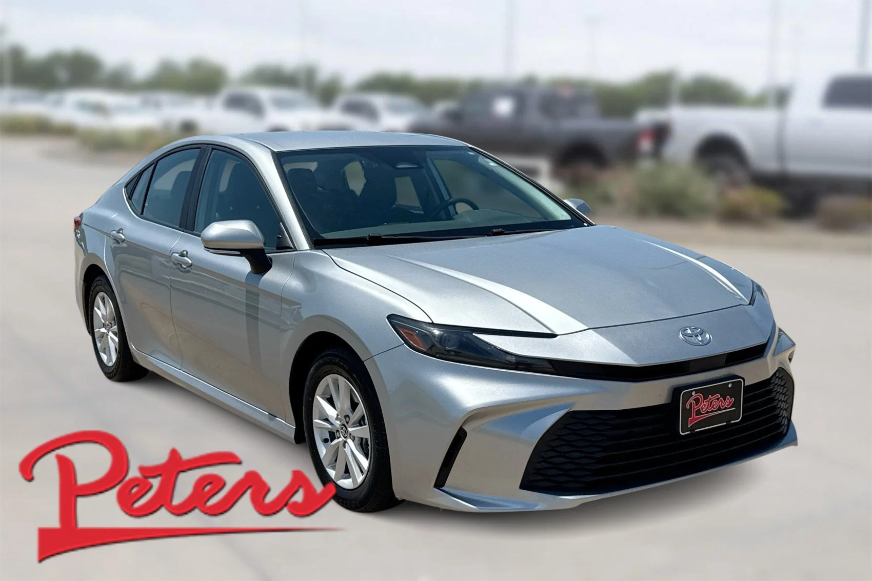 Used 2025 Celestial Silver Metallic Toyota LE image 1