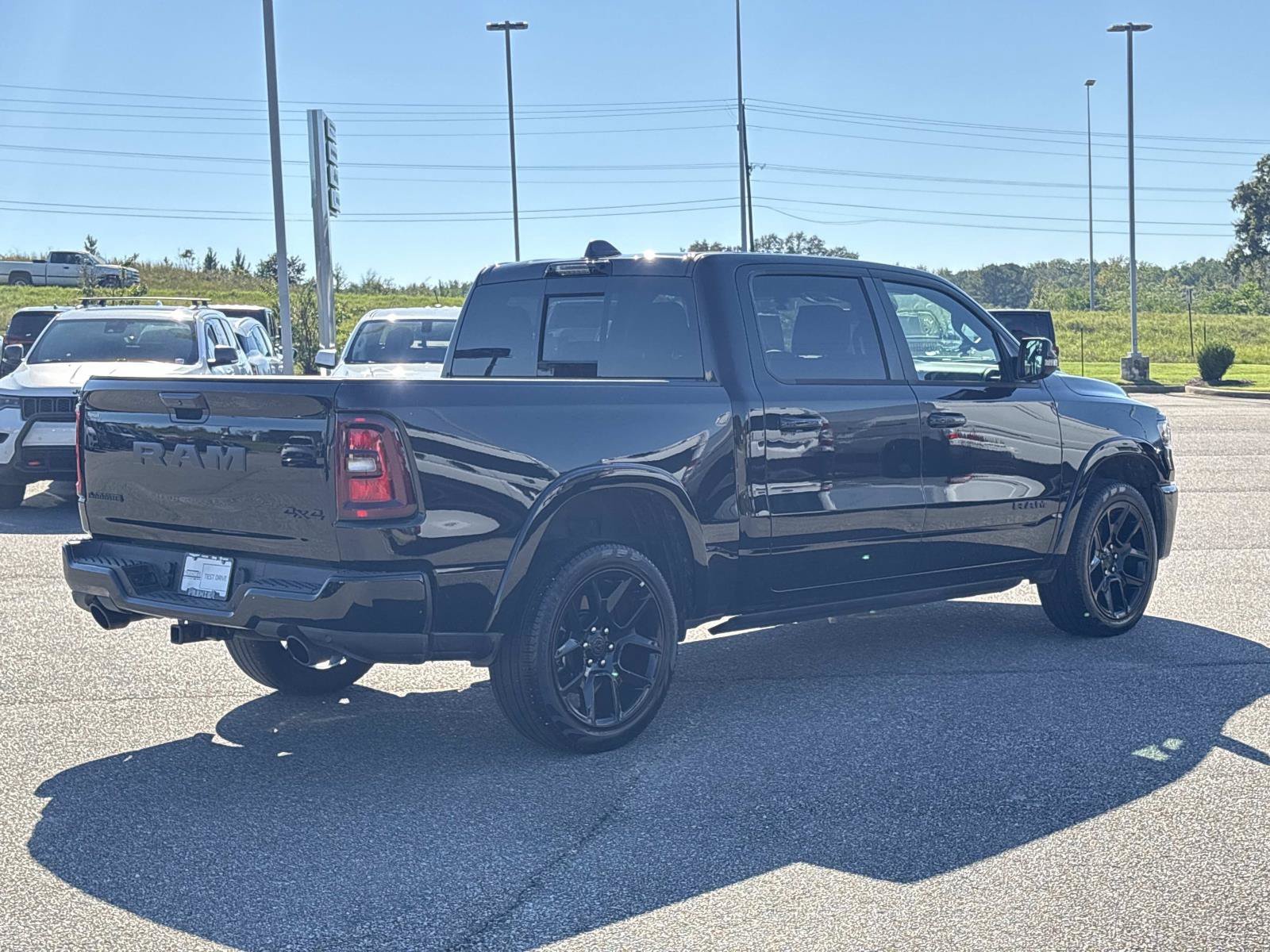 Used 2025 Diamond Black Crystal Pearlcoat Ram Laramie image 4
