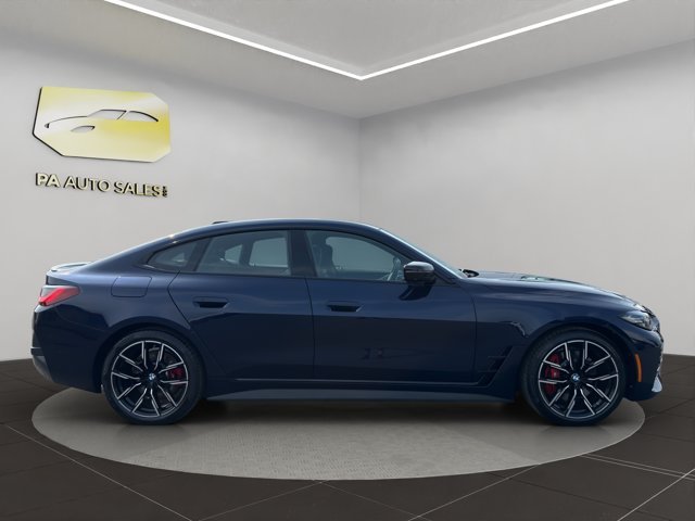 Used 2024 Tanzanite Blue II Metallic BMW 430i xDrive image 8