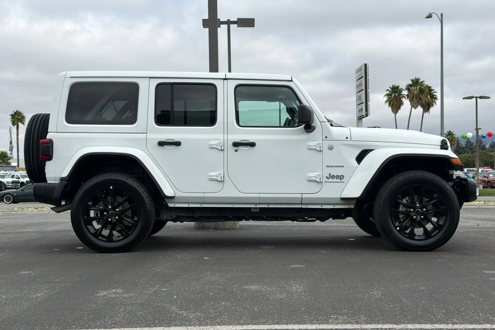 Used 2024 White Jeep Sahara 4xe image 3