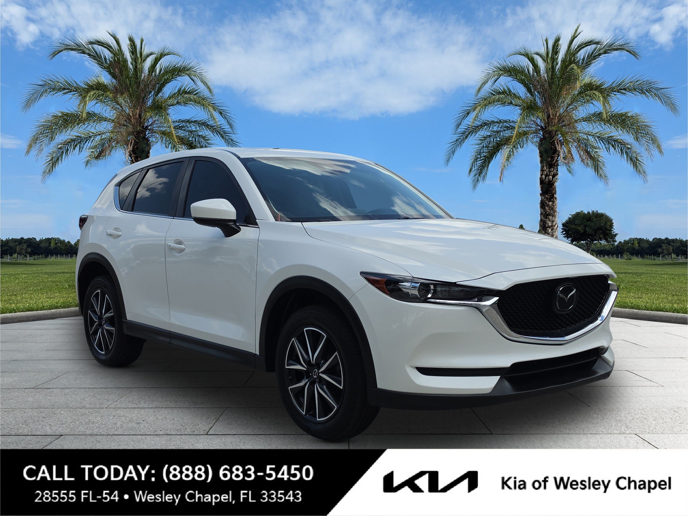 Used 2018 Snowflake White Pearl Mica Mazda Touring image 1