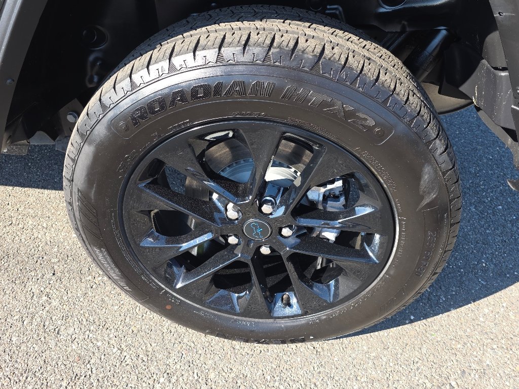 Certified Used 2025 Black Clear Coat Jeep Sahara 4xe image 6