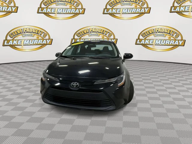 Used 2024 Midnight Black Metallic Toyota LE image 6