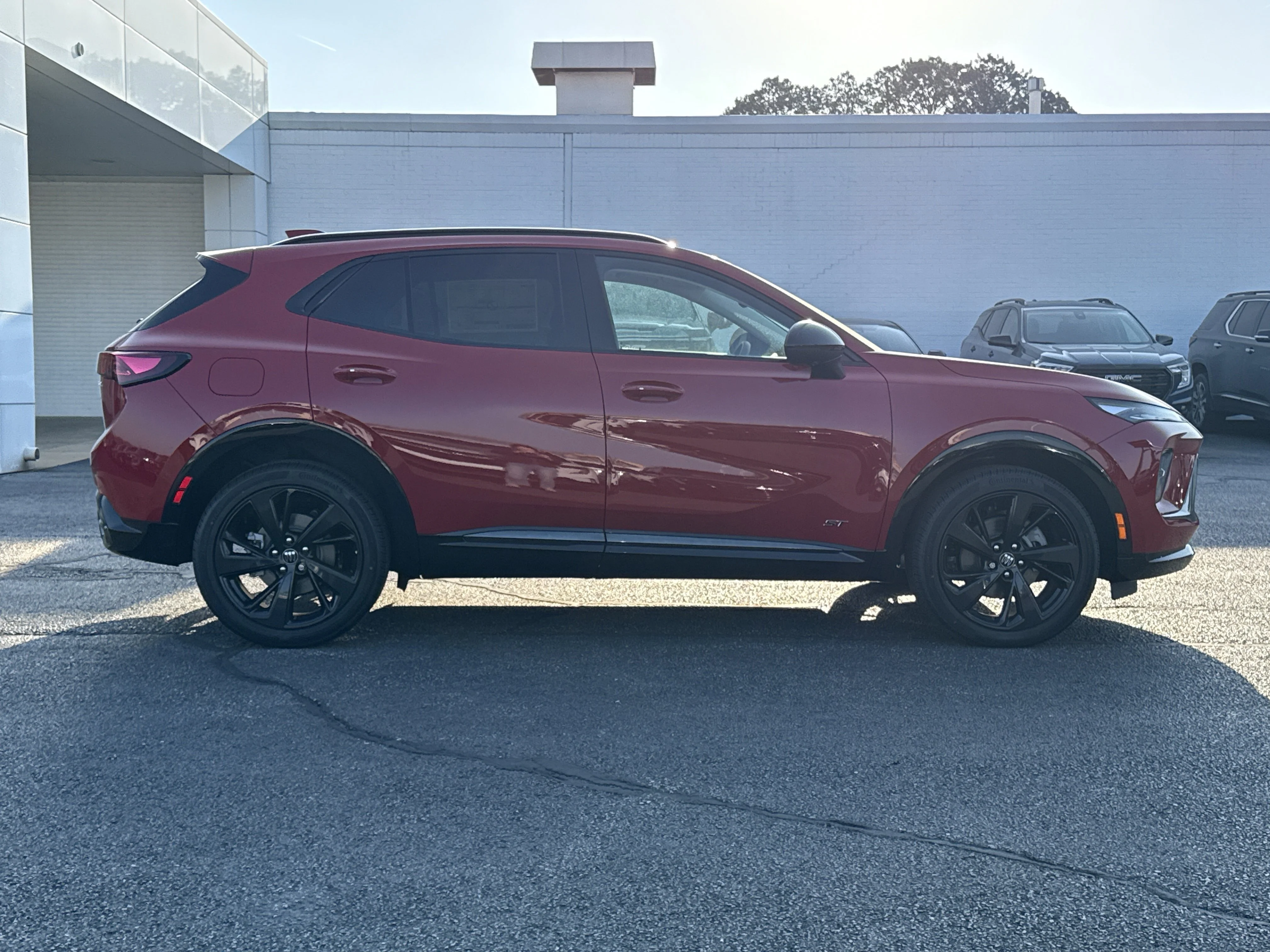 New 2026 Brilliant Red Buick Sport Touring AWD image 2
