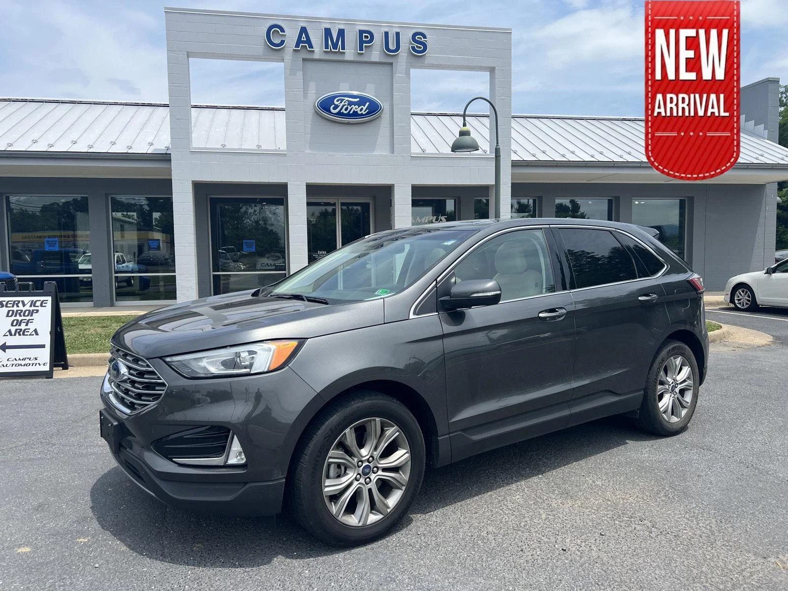 Certified Used 2019 Magnetic Ford Titanium image 1