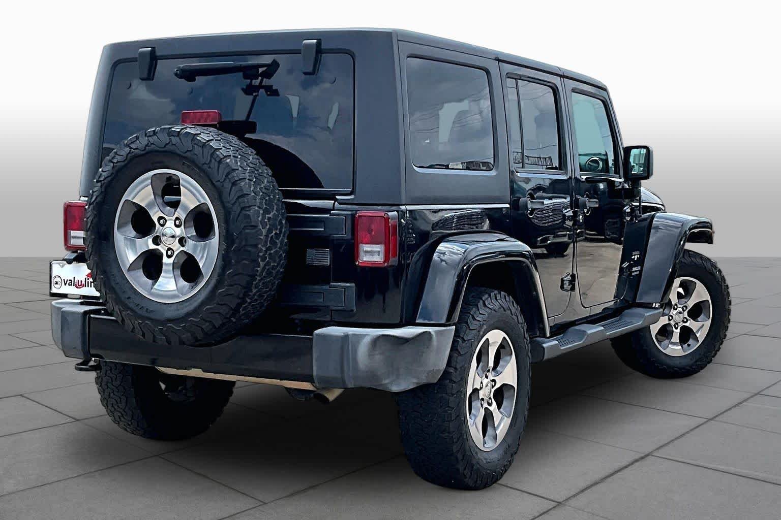 Used 2017 Black Clearcoat Jeep Sahara image 12