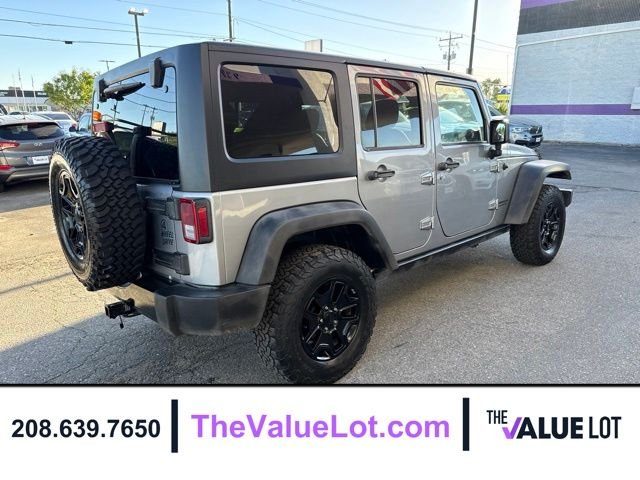 Used 2015 Silver Jeep Unlimited Sport image 4