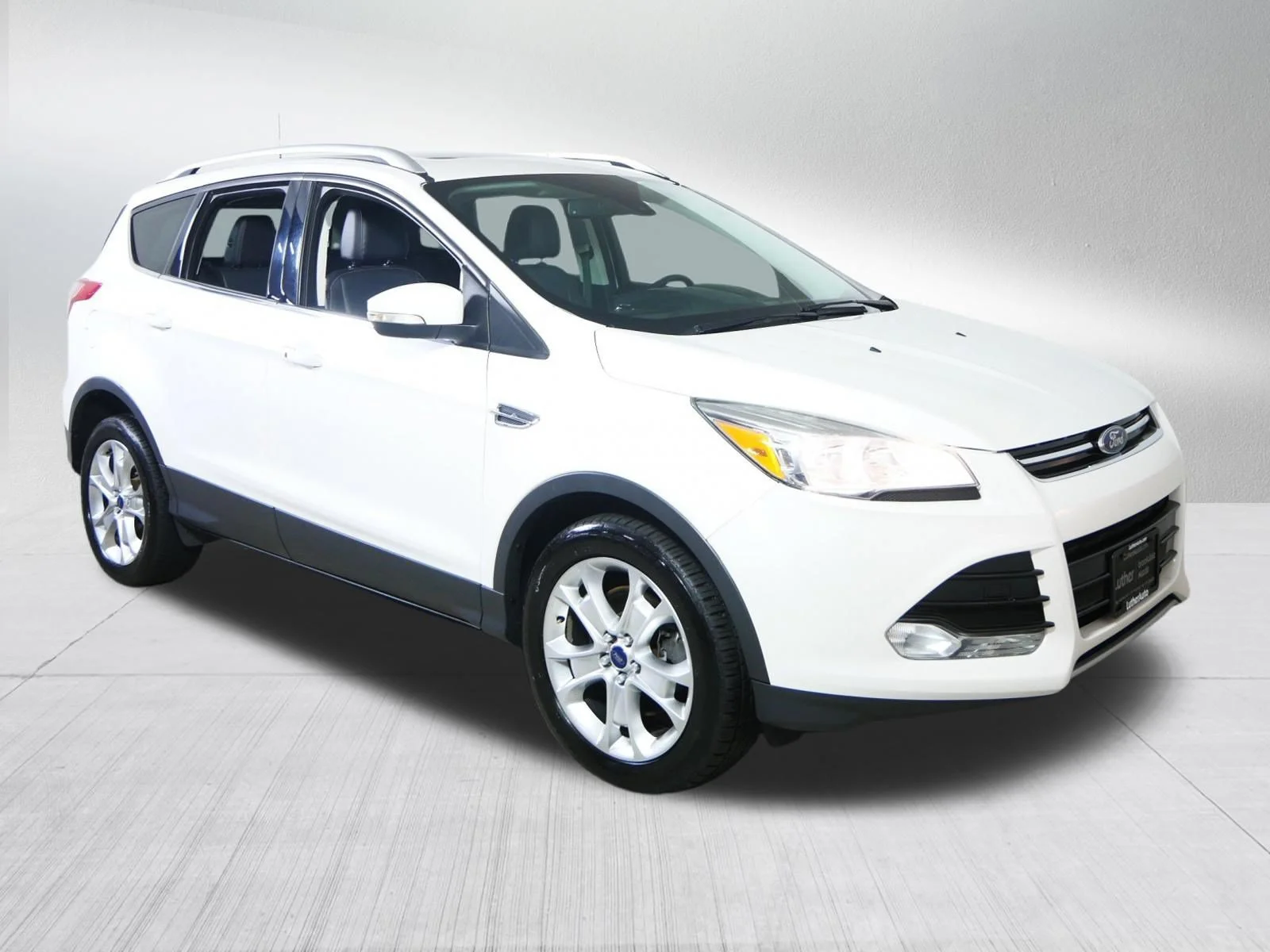 Used 2016 White Platinum Metallic Tri-Coat Ford Titanium image 1