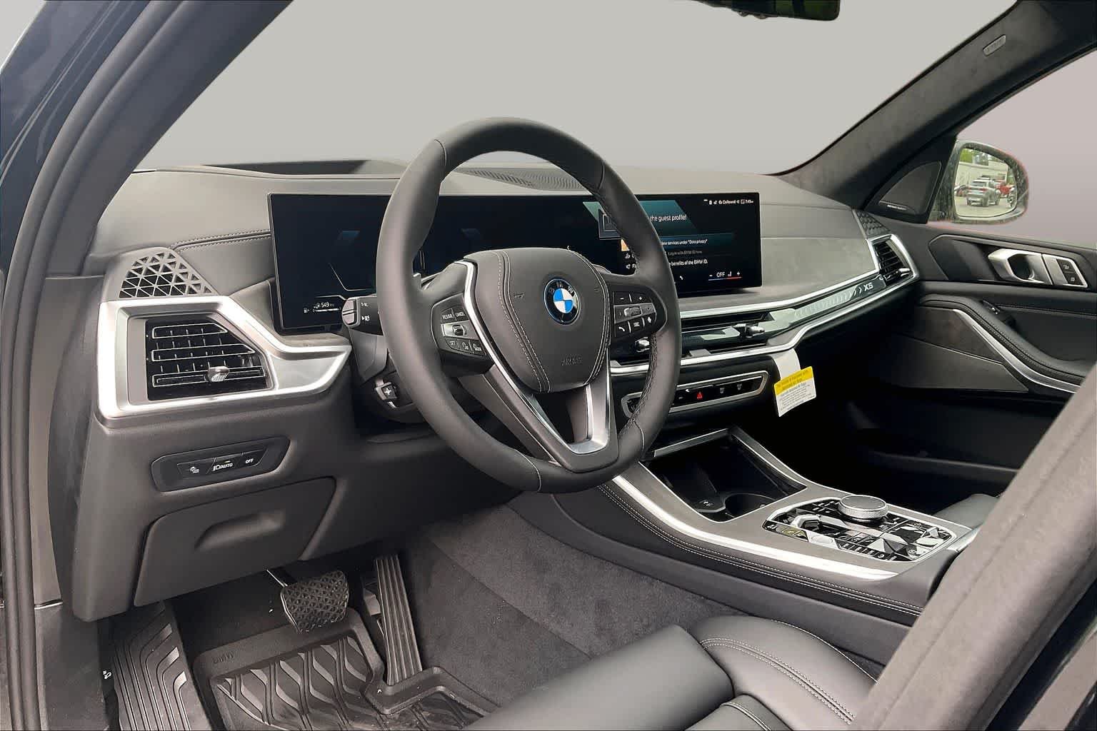 Used 2026 Black Sapphire Metallic BMW xDrive50e image 9