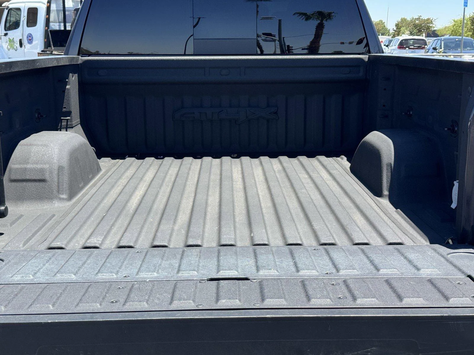 Used 2024 Titanium Rush Metallic GMC AT4X image 14
